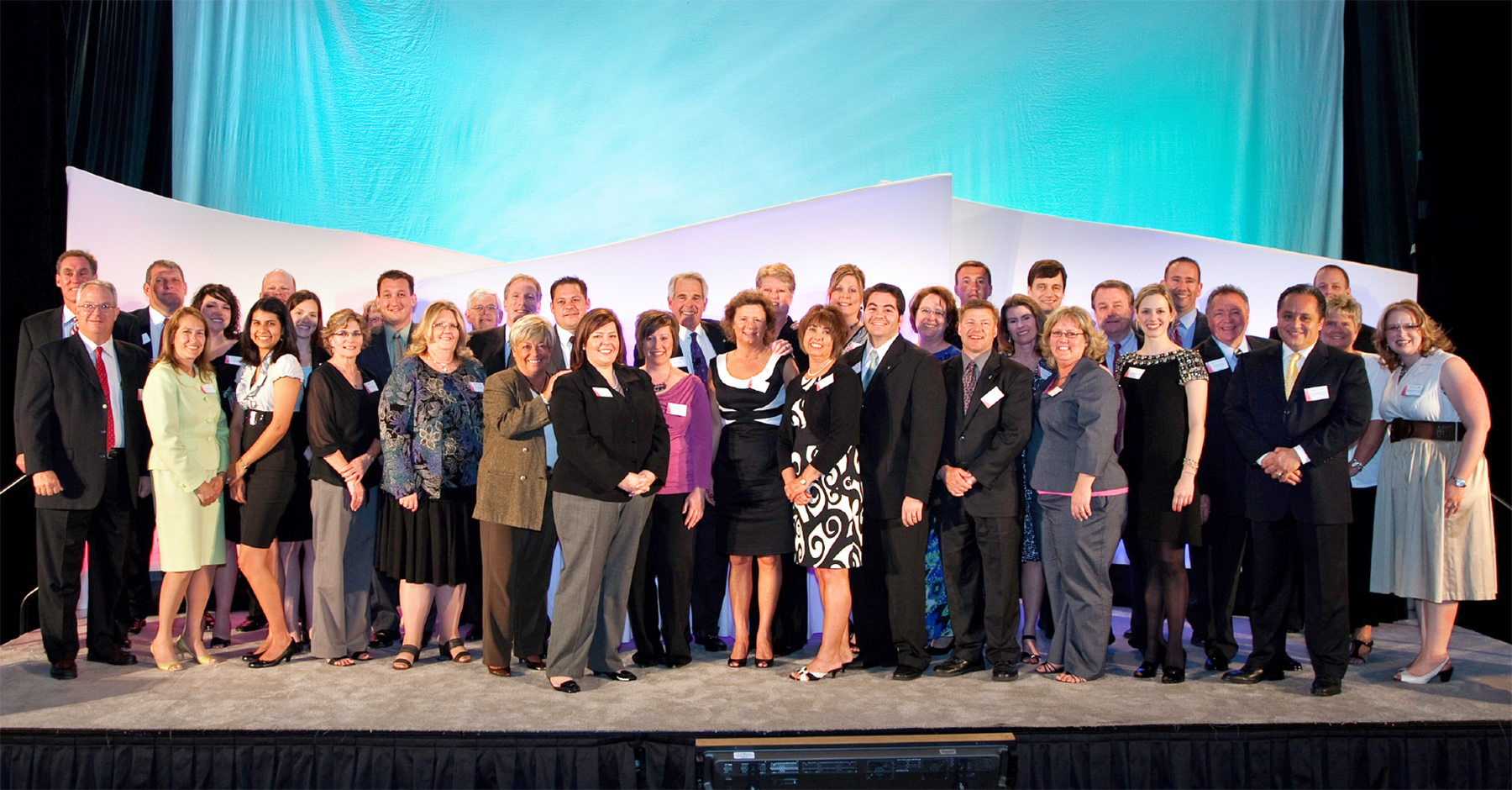 Group picture of Illinois Mutual employees celebrating the Company’s 100th anniversary.
