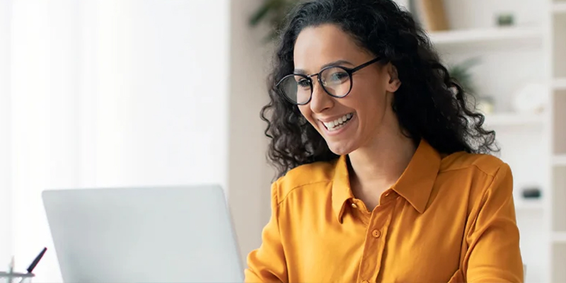 woman typing on the computer