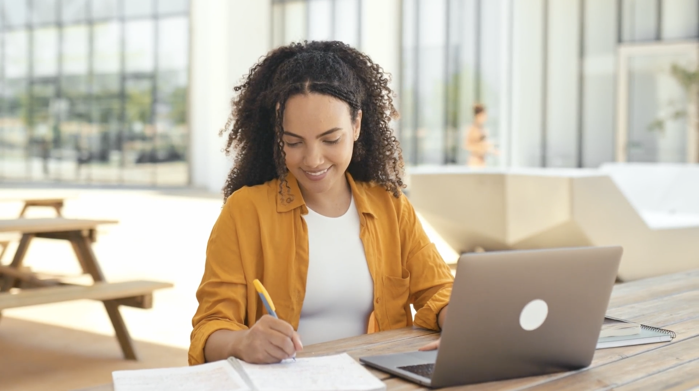 a woman working on her laptop