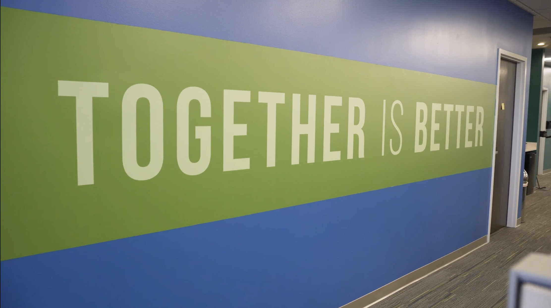 A wall that says "together is better"
