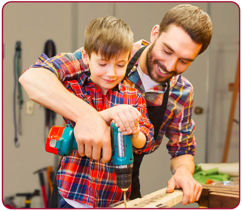 father and son using tools