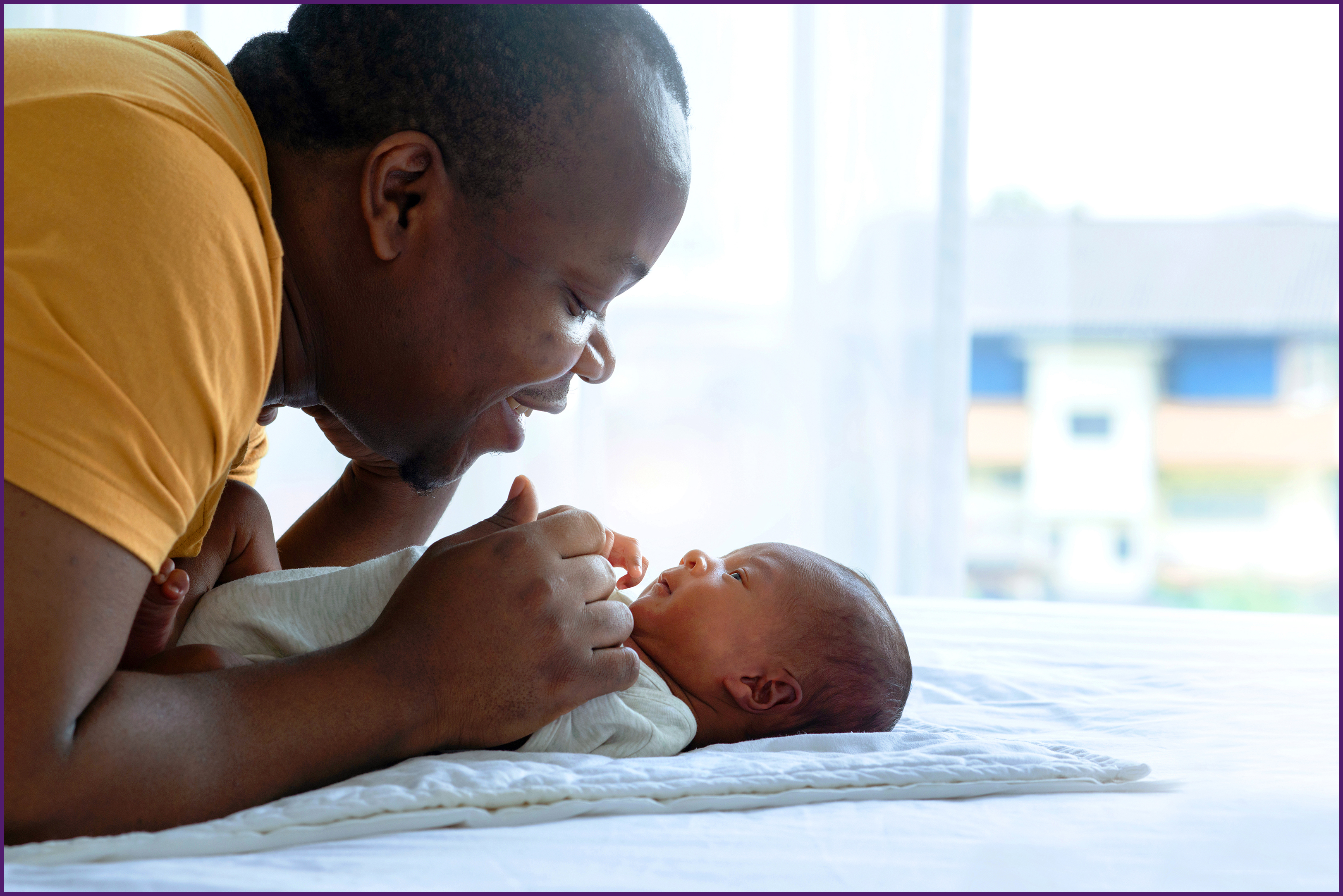 father with his newborn child