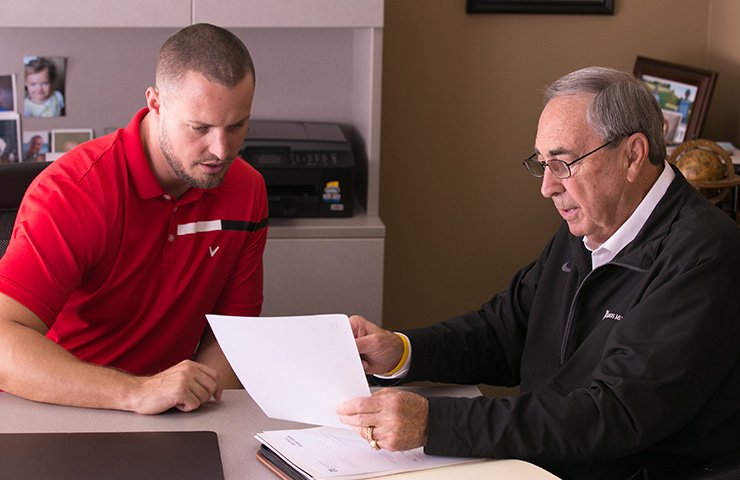 insurance agents reviewing paperwork